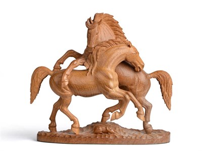 Lot 691 - Mouseman: A Robert Thompson Carved English Oak Stallion Group, modelled as two rearing fighting...