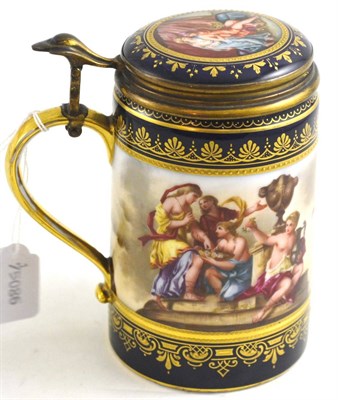 Lot 100 - Vienna blue and gilt decorated tankard with hinged lid, 15cm high