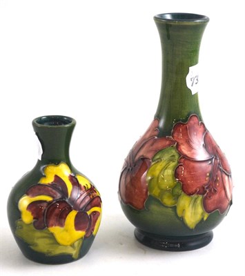 Lot 107 - Small Moorcroft bottle vase and another smaller (chipped)