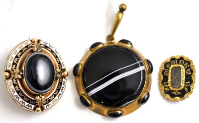 Lot 116 - A sardonyx mourning brooch, a sardonyx pendant and another mourning brooch (3)