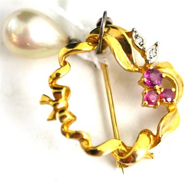 Lot 119 - Pearl drop earring and a circular brooch