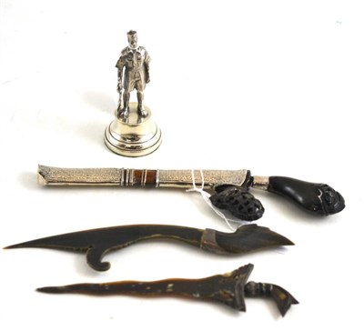 Lot 131 - Silver mounted figure of a soldier, horn handled Eastern dagger with white metal sheath and two...