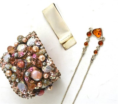 Lot 139 - A money clip, stamped 'TIFFANY & CO' and '925', an amber necklace and beaded cuff