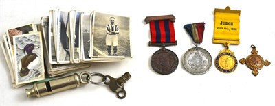 Lot 143 - A whistle 'The Metropolitan', Rochdale County Borough Police medal, Police Sports Judge July...