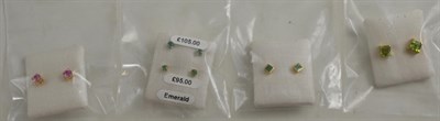 Lot 155 - Three pairs of emerald earrings, a pair of pink sapphire earrings and a pair of peridot earrings