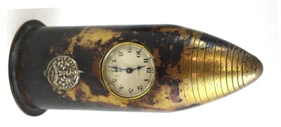 Lot 185 - A First World War trench art artillery shell made in to a clock, with Scottish Tyneside badge
