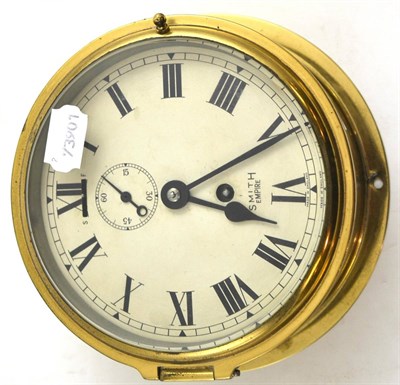 Lot 188 - Smiths clock in a brass circular case (no key)