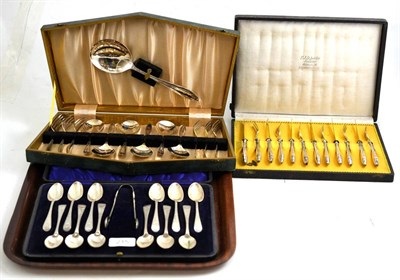 Lot 215 - A cased set of twelve silver teaspoons, a cased set of fruit knives and forks for a six place...