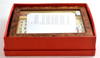 Lot 216 - A modern Harrods mah jong set in a burr elm glazed case