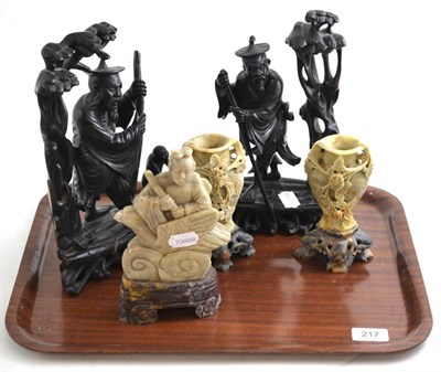 Lot 217 - A group of late 19th century and 20th century wood and soapstone Chinese figural group (5)