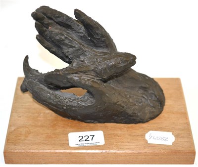 Lot 227 - Josefina de Vasconcellos: ";Hands of God"; a resin sculpture, unsigned, 17cm long on a mahogany...