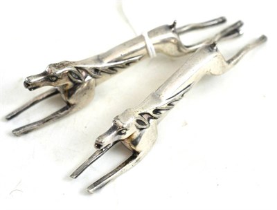 Lot 240 - A pair of WMF silver knife rests in the form of running deer