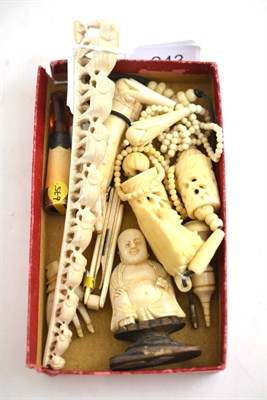 Lot 243 - A group of assorted early 20th century ivory and bone collectables including bead necklace, cheroot