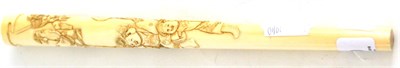 Lot 260 - A late 19th century carved ivory parasol handle