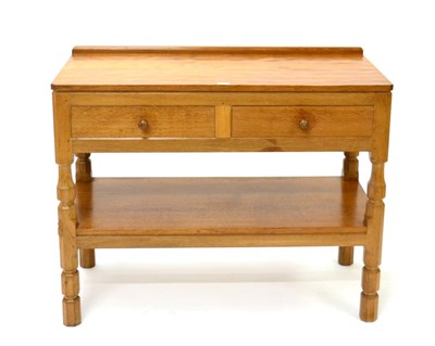 Lot 708 - Mouseman: A Robert Thompson English Oak Serving Table, the raised upstand above two drawers...