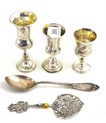 Lot 269 - A Russian silver spoon, Continental pierced spoon impressed '800' and three small silver...