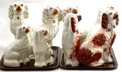 Lot 277 - Four pairs of Staffordshire spaniels (on two trays)