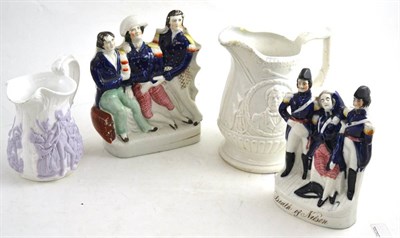 Lot 280 - Two Staffordshire figure groups of Lord Nelson together with two jugs, one depicting Admiral...