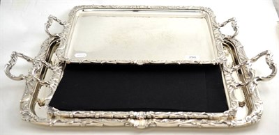 Lot 294 - A pair of silver plated tea trays and another larger