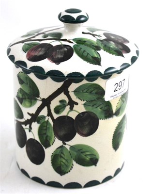 Lot 297 - A Wemyss jar and cover, Plum pattern, 16cm high