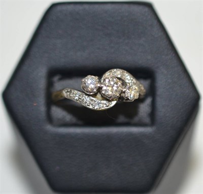 Lot 362 - A three stone diamond ring