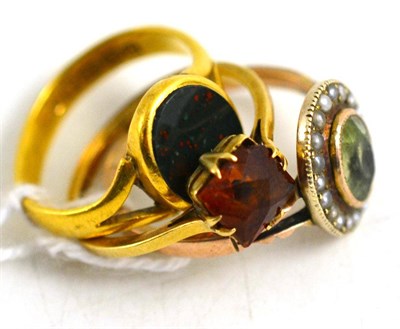 Lot 364 - A 22ct gold and bloodstone ring and two others