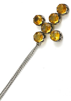 Lot 366 - A citrine cross, six round mixed cut citrines in white coronet claw settings, measures 4.5cm by...