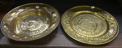 Lot 379 - Two large brass alms dishes