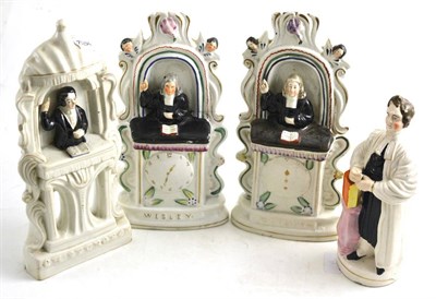 Lot 405 - A group of four Staffordshire figures