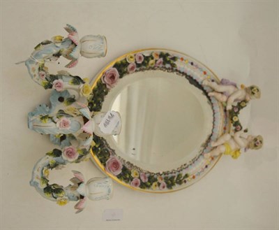 Lot 407 - Dresden encrusted porcelain putti three branch wall girandole