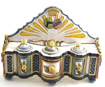 Lot 412 - A French faience inkstand, late 18th/19th century, modelled as a sideboard, with fluted arched...