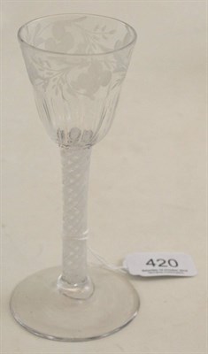 Lot 420 - An 18th century air twist stem glass with etched detail