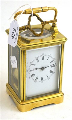 Lot 422 - Brass cased carriage clock and key