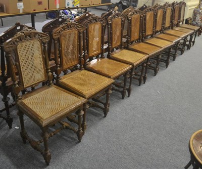 Lot 501 - A set of ten late 19th century oak dining chairs with bergère backs and seats