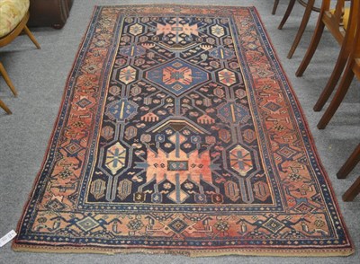 Lot 504 - Bidjar rug, Persian Kurdistan, the deep indigo field with central octagon surrounded by tribal...