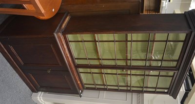 Lot 515 - A pine Victorian astragal glazed bookcase on cabinet