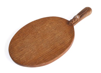 Lot 727 - Mouseman: A Robert Thompson English Oak Cheese Board, with carved mouse signature on the...