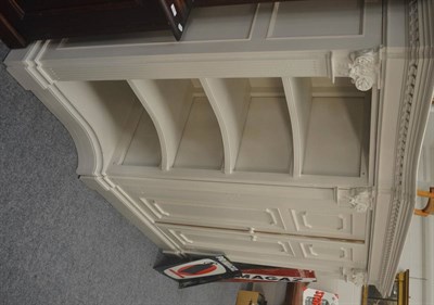 Lot 516 - Large white painted pine cupboard/bookcase in three sections