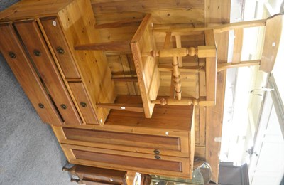 Lot 528 - Pine cupboard, pine coffee table, pine chest of drawers and a rush seated chair (4)