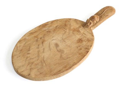 Lot 730 - Mouseman: A Robert Thompson English Oak Cheese Board, with carved mouse signature on the...