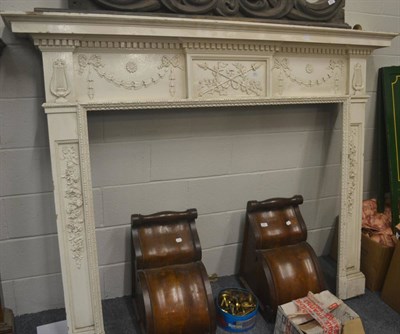 Lot 551 - White painted fireplace decorated with swags