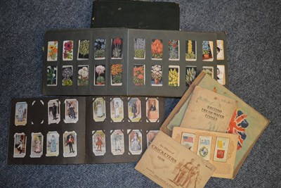 Lot 555 - A collection of assorted cigarette cards