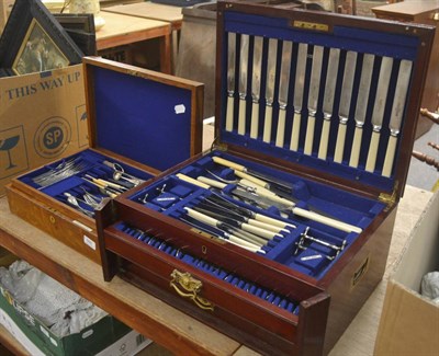 Lot 566 - An Edwardian mahogany canteen together with a 1920's oak canteen and contents