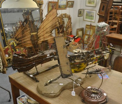 Lot 591 - Two modern sculptures of boats and a similar example of two planes, all using recycled materials