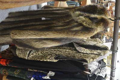 Lot 594 - Paul Rolofs Germany bobcat fur gilet with a brown textured suede trim, button fastening and...