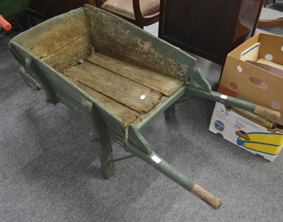 Lot 603 - A green painted wooden wheel barrow