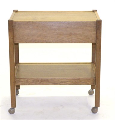 Lot 737 - Acorn Industries: An English Oak Tea Trolley, the rectangular top over a single drawer above an...