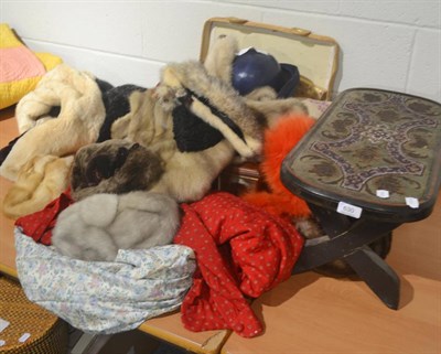 Lot 630 - Ebonised stool with beadwork mount, two oak cased Elliott mantel clocks, fur hats, red Liberty...