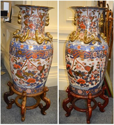 Lot 643 - A pair of large Oriental vases in 18th century style on stands