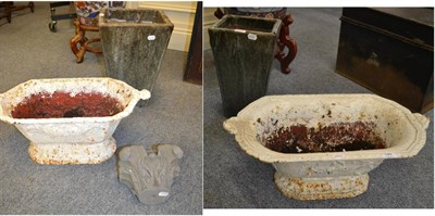 Lot 644 - Pair of white painted oval planters, two glazed pottery planters and a stone bosse